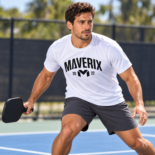 White Maverix 100% polyester shirt — pickleball action
